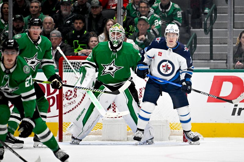 Feb 29, 2024; Dallas, Texas, USA; Dallas Stars goaltender Jake Oettinger (29) and Winnipeg Jets center Vladislav Namestnikov (7) look for the puck in the Stars zone during the second period at the American Airlines Center. Mandatory Credit: Jerome Miron-USA TODAY Sports