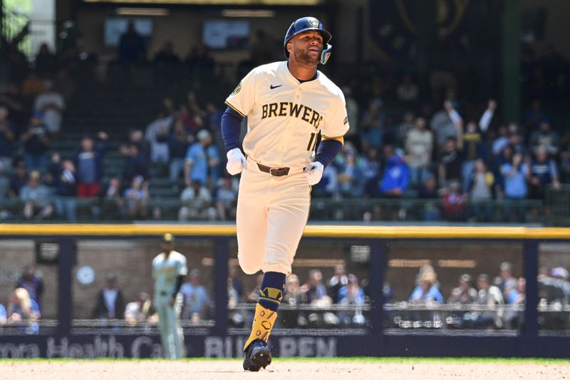 May 15, 2024; Milwaukee, Wisconsin, USA;  Milwaukee Brewers left fielder Jackson Chourio (11) runs the bases after hitting a 2-run home run in the in the sixth inning against the Pittsburgh Pirates at American Family Field. Mandatory Credit: Benny Sieu-USA TODAY Sports