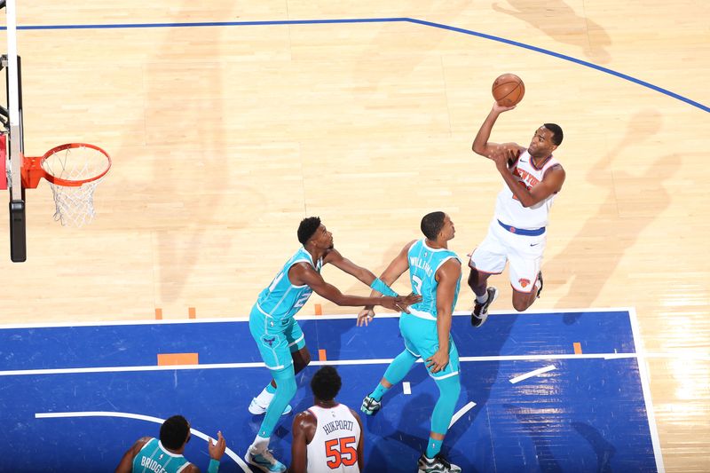 NEW YORK, NY - OCTOBER 15: T.J. Warren #21 of the New York Knicks drives to the basket during the game against the Charlotte Hornets during the 2024 NBA Preseason on October 15, 2024 at Madison Square Garden in New York City, New York.  NOTE TO USER: User expressly acknowledges and agrees that, by downloading and or using this photograph, User is consenting to the terms and conditions of the Getty Images License Agreement. Mandatory Copyright Notice: Copyright 2024 NBAE  (Photo by Nathaniel S. Butler/NBAE via Getty Images)