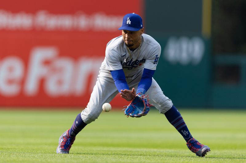 Jun 10, 2023; Philadelphia, Pennsylvania, USA; Los Angeles Dodgers right fielder Mookie Betts (50) fields a ground ball for an out against Philadelphia Phillies center fielder Brandon Marsh (not pictured) during the fourth inning at Citizens Bank Park. Mandatory Credit: Bill Streicher-USA TODAY Sports