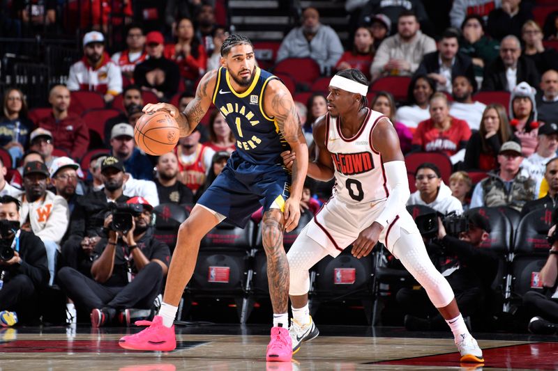 HOUSTON, TX - NOVEMBER 20:  Obi Toppin #1 of the Indiana Pacers dribbles the ball during the game against the Houston Rockets on November 20, 2024 at the Toyota Center in Houston, Texas. NOTE TO USER: User expressly acknowledges and agrees that, by downloading and or using this photograph, User is consenting to the terms and conditions of the Getty Images License Agreement. Mandatory Copyright Notice: Copyright 2024 NBAE (Photo by Logan Riely/NBAE via Getty Images)