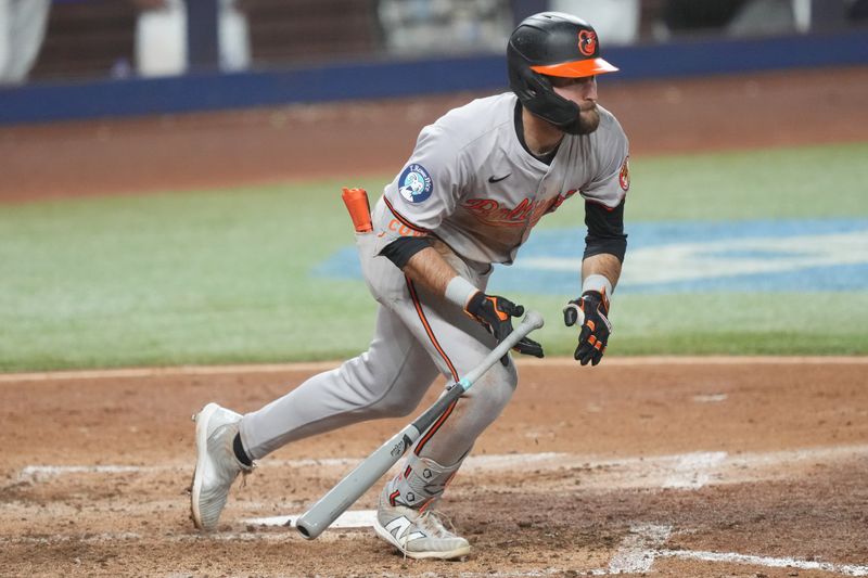 Jul 24, 2024; Miami, Florida, USA;  Baltimore Orioles left fielder Colton Cowser (17) hits a three-run double in the sixth inning against the Miami Marlins at loanDepot Park. Mandatory Credit: Jim Rassol-USA TODAY Sports