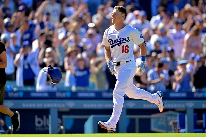 Aug 31, 2025; Los Angeles, California, USA;  Los Angeles Dodgers catcher Will Smith (16) celebrates as he rounds the bases on a walk-off home run in the ninth inning against the Arizona Diamondbacks at Dodger Stadium. Mandatory Credit: Jayne Kamin-Oncea-Imagn Images