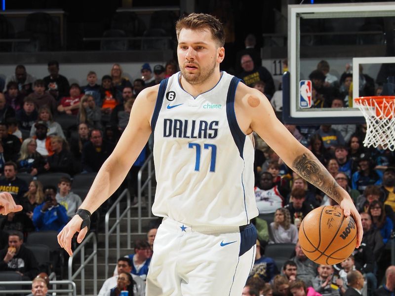 INDIANAPOLIS, IN - MARCH 27: Luka Doncic #77 of the Dallas Mavericks dribbles the ball during the game against the Indiana Pacers on March 27, 2023 at Gainbridge Fieldhouse in Indianapolis, Indiana. NOTE TO USER: User expressly acknowledges and agrees that, by downloading and or using this Photograph, user is consenting to the terms and conditions of the Getty Images License Agreement. Mandatory Copyright Notice: Copyright 2023 NBAE (Photo by Ron Hoskins/NBAE via Getty Images)