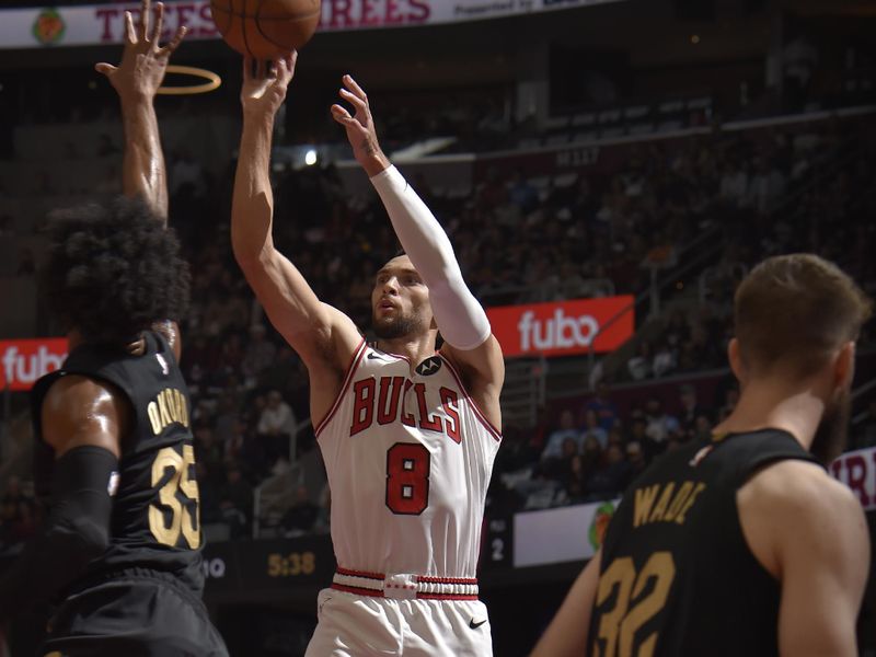 CLEVELAND, OH - November 15: Zach LaVine #8 of the Chicago Bulls shoots a three point basket during the game against the Cleveland Cavaliers during the Emirates NBA Cup game on November 15, 2024 at Rocket Mortgage FieldHouse in Cleveland, Ohio. NOTE TO USER: User expressly acknowledges and agrees that, by downloading and/or using this Photograph, user is consenting to the terms and conditions of the Getty Images License Agreement. Mandatory Copyright Notice: Copyright 2024 NBAE (Photo by David Liam Kyle/NBAE via Getty Images)