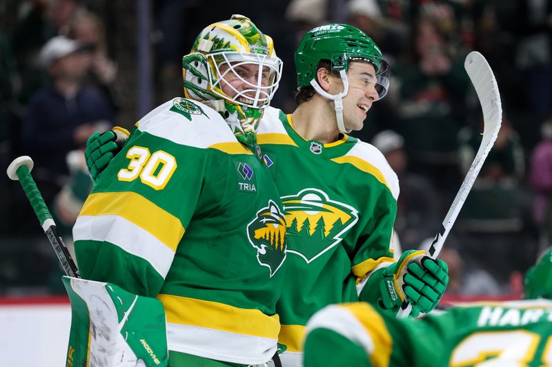 Nov 9, 2025; Saint Paul, Minnesota, USA; Minnesota Wild goaltender Jesper Wallstedt (30) celebrates the teams win against the Calgary Flames after the game at Grand Casino Arena. Mandatory Credit: Matt Krohn-Imagn Images