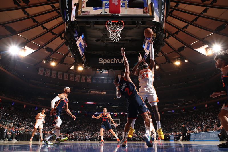 NEW YORK, NY - MARCH 5: Bruno Fernando #24 of the Atlanta Hawks drives to the basket during the game against the New York Knicks on March 5, 2024 at Madison Square Garden in New York City, New York.  NOTE TO USER: User expressly acknowledges and agrees that, by downloading and or using this photograph, User is consenting to the terms and conditions of the Getty Images License Agreement. Mandatory Copyright Notice: Copyright 2024 NBAE  (Photo by Nathaniel S. Butler/NBAE via Getty Images)