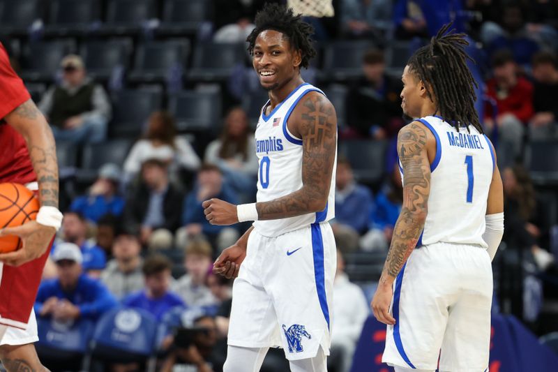 Jan 14, 2026; Memphis, Tennessee, USA; Memphis Tigers guard Quante Berry (0) reacts after a three point basket against the Temple Owls during the first half at FedExForum. Mandatory Credit: Wesley Hale-Imagn Images