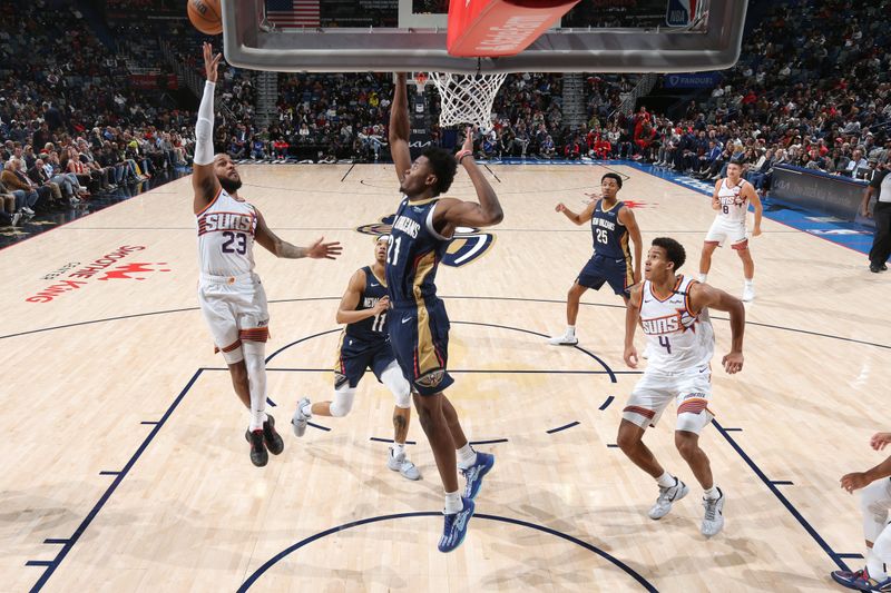 NEW ORLEANS, LA - DECEMBER 5: Monte Morris #23 of the Phoenix Suns drives to the basket during the game against the New Orleans Pelicans on December 5, 2024 at the Smoothie King Center in New Orleans, Louisiana. NOTE TO USER: User expressly acknowledges and agrees that, by downloading and or using this Photograph, user is consenting to the terms and conditions of the Getty Images License Agreement. Mandatory Copyright Notice: Copyright 2024 NBAE (Photo by Layne Murdoch Jr./NBAE via Getty Images)