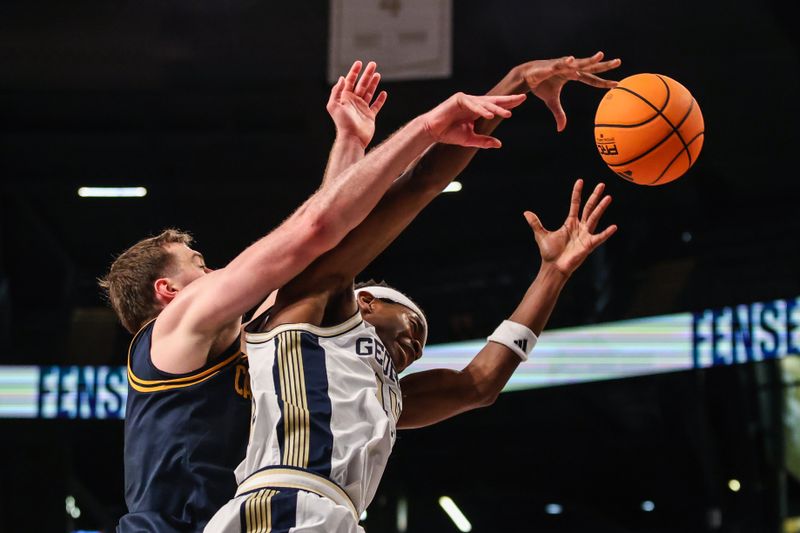 Mar 4, 2026; Atlanta, Georgia, USA; California Golden Bears center Milos Ilic (8) reaches for the rebound against Georgia Tech Yellow Jackets forward Kowacie Reeves Jr. (14) during the first half at McCamish Pavilion. Mandatory Credit: Jordan Godfree-Imagn Images