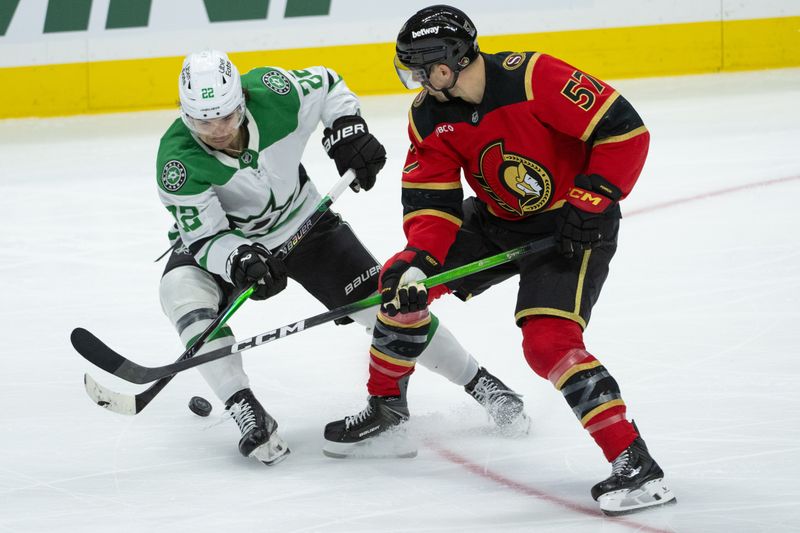 Nov 11, 2025; Ottawa, Ontario, CAN; Dallas Stars center Mavrik Bourque (22) and Ottawa Senators left wing David Perron (57) battle for control of the puck in the third period at the Canadian Tire Centre. Mandatory Credit: Marc DesRosiers-IMAGN Images