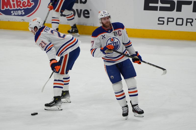 Jun 9, 2025; Sunrise, Florida, USA; Edmonton Oilers center Connor McDavid (97) warms up prior to the first period against the Florida Panthers in game three of the 2025 Stanley Cup Final at Amerant Bank Arena. Mandatory Credit: Jim Rassol-Imagn Images