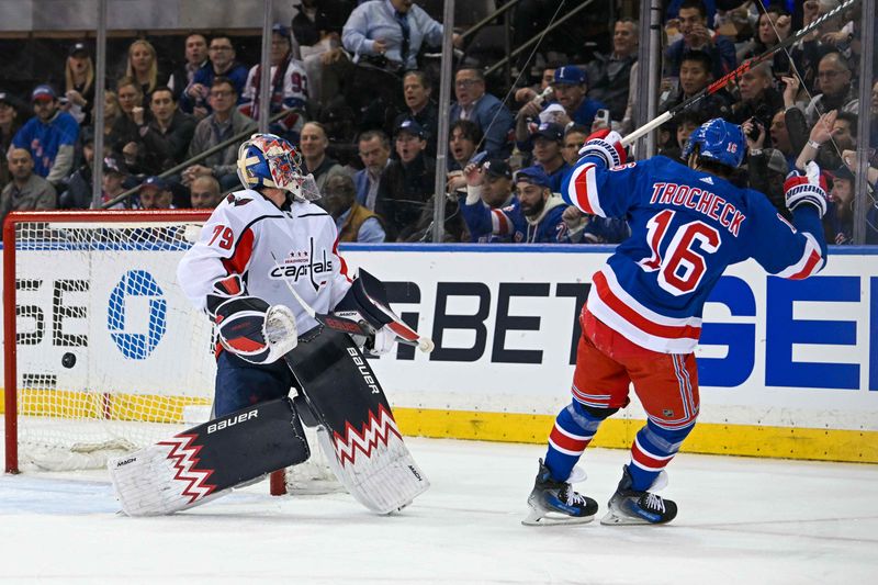 Apr 23, 2024; New York, New York, USA;  New York Rangers center Vincent Trocheck (16) celebrates his goal past Washington Capitals goaltender Charlie Lindgren (79) during the first period in game two of the first round of the 2024 Stanley Cup Playoffs at Madison Square Garden. Mandatory Credit: Dennis Schneidler-USA TODAY Sports