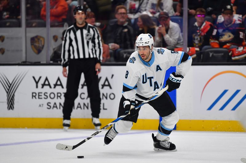 Oct 16, 2024; Anaheim, California, USA; Utah Hockey Club center Nick Schmaltz (8) controls the puck against the Anaheim Ducks during the first period at Honda Center. Mandatory Credit: Gary A. Vasquez-Imagn Images