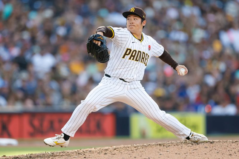 May 27, 2024; San Diego, California, USA; San Diego Padres relief pitcher Yuki Matsui (1) throws a pitch in the eighth inning against against the Miami Marlins at Petco Park. Mandatory Credit: David Frerker-USA TODAY Sports