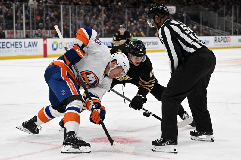 Nov 9, 2023; Boston, Massachusetts, USA; Faceoff between New York Islanders center Casey Cizikas (53) and Boston Bruins center Johnny Beecher (19) during the second period at the TD Garden. Mandatory Credit: Brian Fluharty-USA TODAY Sports