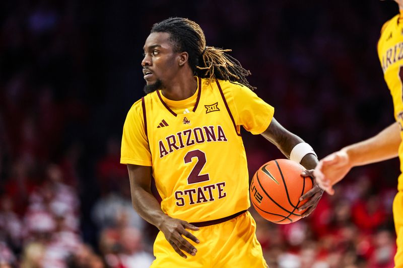 Jan 14, 2026; Tucson, Arizona, USA; Arizona State Sun Devils guard Anthony “Pig” Johnson (2) dribbles the ball during the first half of the game against the Arizona Wildcats at McKale Memorial Center. Mandatory Credit: Aryanna Frank-Imagn Images