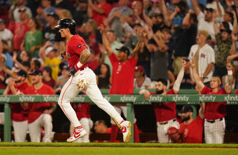 Aug 26, 2024; Boston, Massachusetts, USA; Boston Red Sox center fielder Jarren Duran (16) hits a two run home run against the Toronto Blue Jays in the eighth inning at Fenway Park. Mandatory Credit: David Butler II-USA TODAY Sports