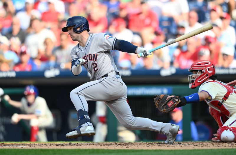Aug 28, 2024; Philadelphia, Pennsylvania, USA; Houston Astros infielder Alex Bregman (2) hits a single against the Philadelphia Phillies in the third inning at Citizens Bank Park. Mandatory Credit: Kyle Ross-USA TODAY Sports