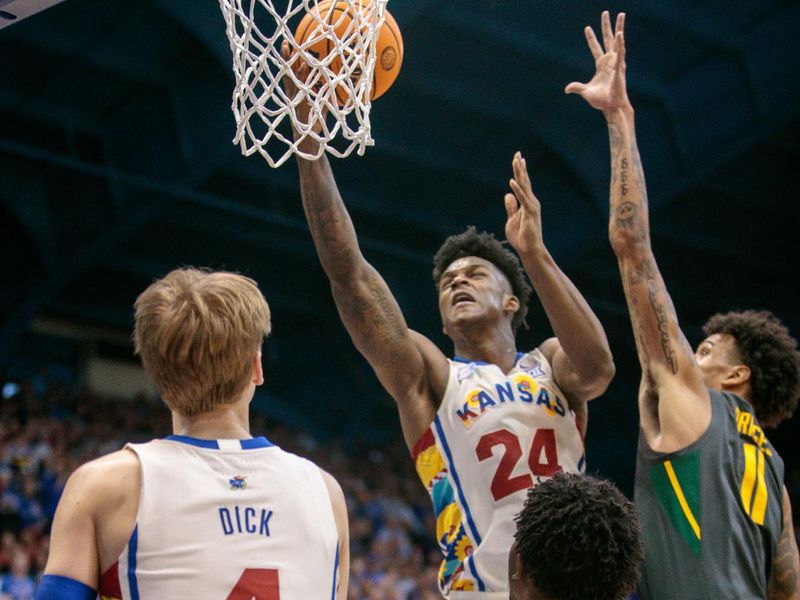 Feb 18, 2023; Lawrence, Kansas, USA; Kansas Jayhawks forward K.J. Adams Jr. (24) puts up a shot during the second half against the Baylor Bears at Allen Fieldhouse. Mandatory Credit: William Purnell-USA TODAY Sports