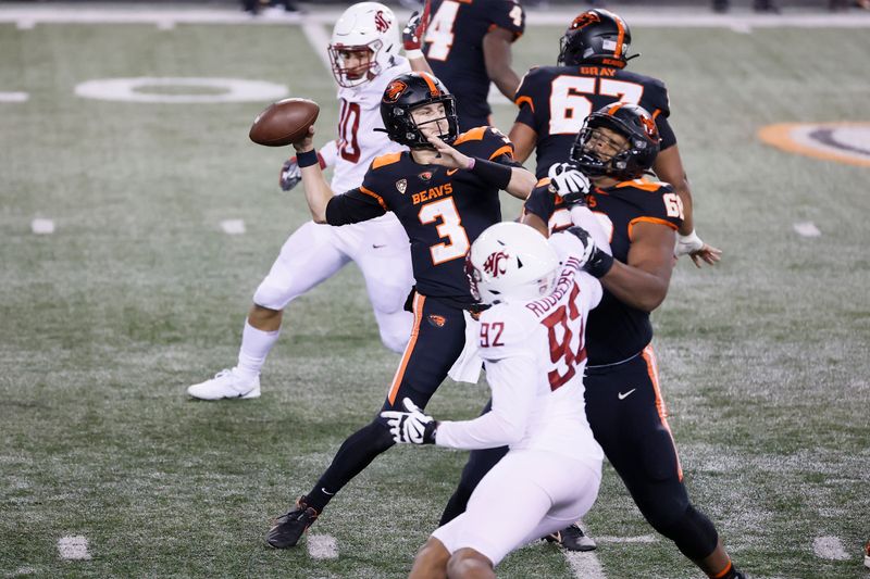 Nov 7, 2020; Corvallis, Oregon, USA; Oregon State Beavers quarterback Tristan Gebbia (3) looks to throw against the Washington State Cougars during the first half at Reser Stadium. Mandatory Credit: Soobum Im-USA TODAY Sports