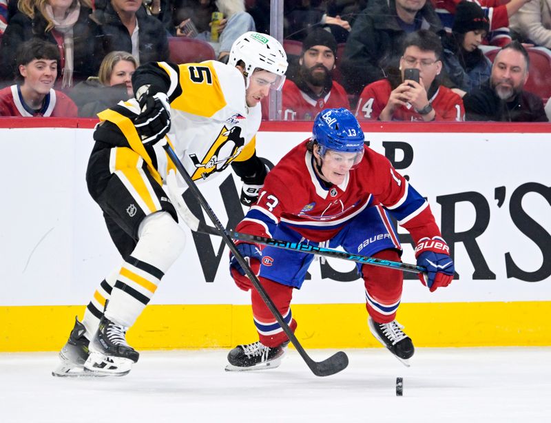 Dec 20, 2025; Montreal, Quebec, CAN; Pittsburgh Penguins defenseman Ryan Shea (5) and Montreal Canadiens forward Cole Caufield (13) battle for the puck during the second period at the Bell Centre. Mandatory Credit: Eric Bolte-Imagn Images