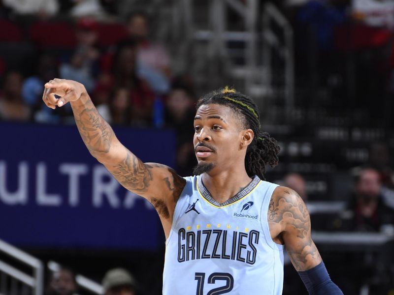 HOUSTON, TX - OCTOBER 25: Ja Morant #12 of the Memphis Grizzlies looks on during the game against the Houston Rockets on October 25, 2024 at the Toyota Center in Houston, Texas. NOTE TO USER: User expressly acknowledges and agrees that, by downloading and or using this photograph, User is consenting to the terms and conditions of the Getty Images License Agreement. Mandatory Copyright Notice: Copyright 2024 NBAE (Photo by Logan Riely/NBAE via Getty Images)