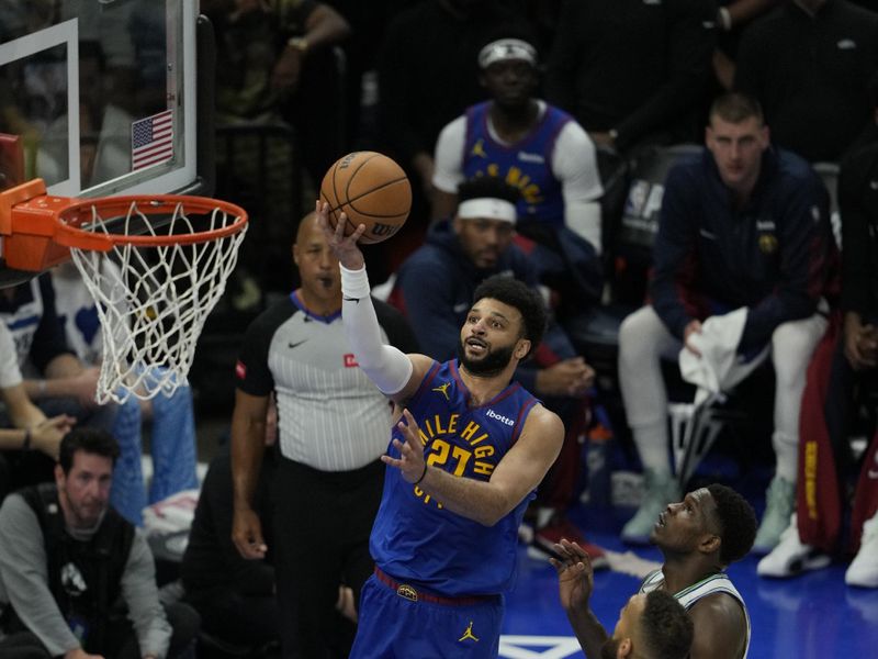 MINNEAPOLIS, MN -  MAY 16: Jamal Murray #27 of the Denver Nuggets shoots the ball during the game against the Minnesota Timberwolves during Round 2 Game 6 of the 2024 NBA Playoffs on May 16, 2024 at Target Center in Minneapolis, Minnesota. NOTE TO USER: User expressly acknowledges and agrees that, by downloading and or using this Photograph, user is consenting to the terms and conditions of the Getty Images License Agreement. Mandatory Copyright Notice: Copyright 2024 NBAE (Photo by Jordan Johnson/NBAE via Getty Images)