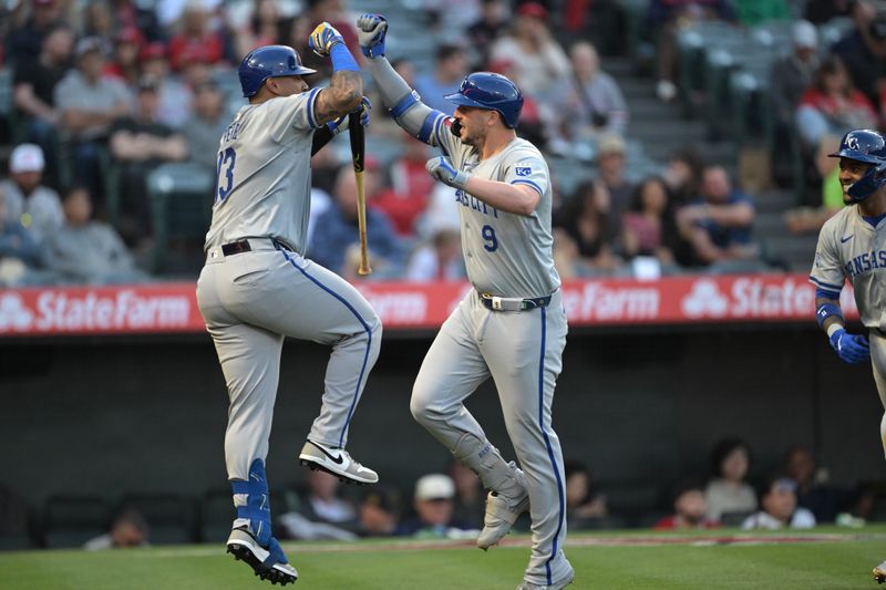 May 9, 2024; Anaheim, California, USA;  Kansas City Royals first baseman Vinnie Pasquantino (9) celebrates with catcher Salvador Perez (13) after hitting a two-run home run against the Los Angeles Angels in the third inning at Angel Stadium. Mandatory Credit: Jayne Kamin-Oncea-USA TODAY Sports