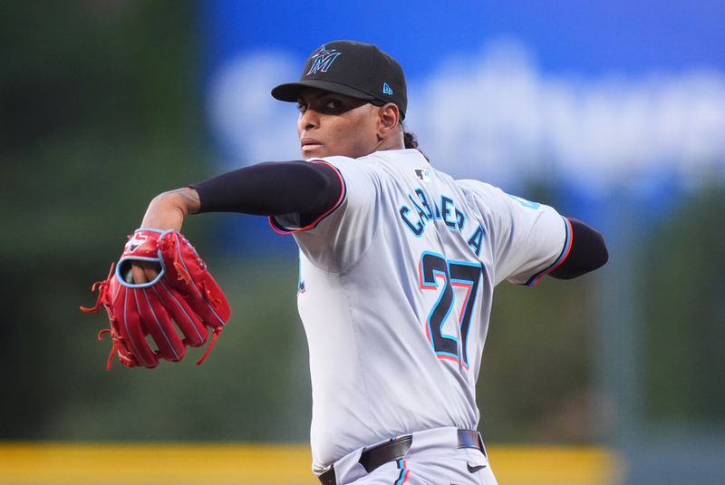 Aug 26, 2024; Denver, Colorado, USA; Miami Marlins starting pitcher Edward Cabrera (27) delivers a pitch in the first inning against the Colorado Rockies at Coors Field. Mandatory Credit: Ron Chenoy-USA TODAY Sports