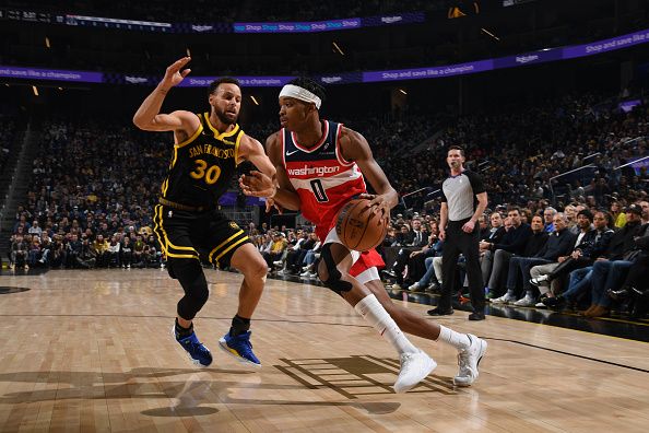 SAN FRANCISCO, CA - DECEMBER 22: Bilal Coulibaly #0 of the Washington Wizards drives to the basket during the game against the Golden State Warriors on December 22, 2023 at Chase Center in San Francisco, California. NOTE TO USER: User expressly acknowledges and agrees that, by downloading and or using this photograph, user is consenting to the terms and conditions of Getty Images License Agreement. Mandatory Copyright Notice: Copyright 2023 NBAE (Photo by Noah Graham/NBAE via Getty Images)