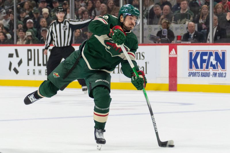 Dec 21, 2023; Saint Paul, Minnesota, USA; Minnesota Wild left wing Marcus Johansson (90) shoots against the Montreal Canadiens in the first period at Xcel Energy Center. Mandatory Credit: Matt Blewett-USA TODAY Sports