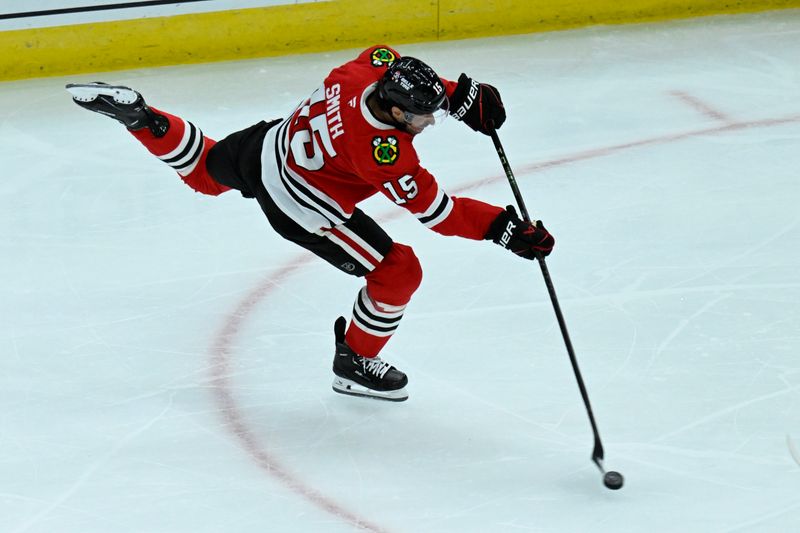 Oct 19, 2024; Chicago, Illinois, USA;  Chicago Blackhawks center Craig Smith (15) scores a goal against the Buffalo Sabres during the second period at the United Center. Mandatory Credit: Matt Marton-Imagn Images