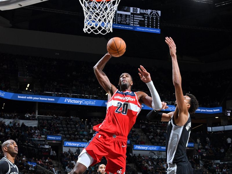 SAN ANTONIO, TX - NOVEMBER 13: Alexandre Sarr #20 of the Washington Wizards dunks the ball during the game against the San Antonio Spurs on November 13, 2024 at the Frost Bank Center in San Antonio, Texas. NOTE TO USER: User expressly acknowledges and agrees that, by downloading and or using this photograph, user is consenting to the terms and conditions of the Getty Images License Agreement. Mandatory Copyright Notice: Copyright 2024 NBAE (Photos by Michael Gonzales/NBAE via Getty Images)