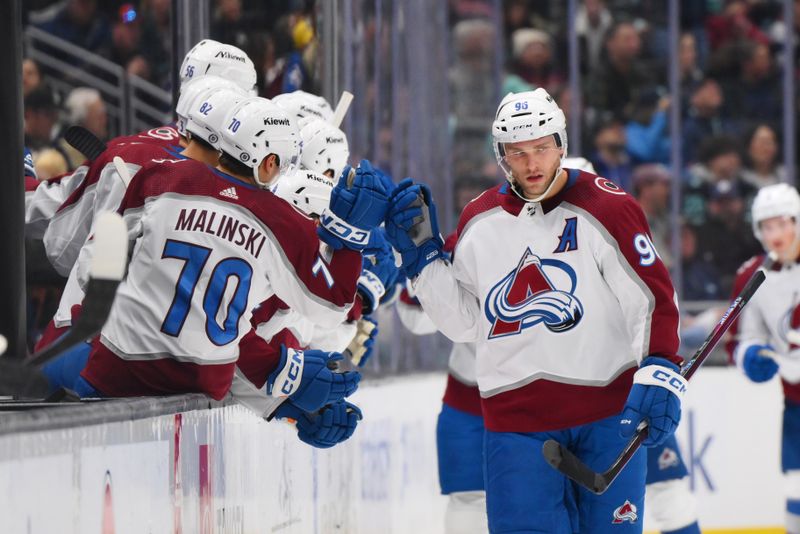 Nov 13, 2023; Seattle, Washington, USA; Colorado Avalanche right wing Mikko Rantanen (96) celebrates with teammates after scoring a goal against the Seattle Kraken during the second period at Climate Pledge Arena. Mandatory Credit: Steven Bisig-USA TODAY Sports