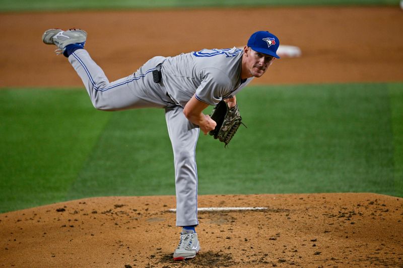 Sep 17, 2024; Arlington, Texas, USA; Toronto Blue Jays starting pitcher Chris Bassitt (40) pitches against the Texas Rangers during the first inning at Globe Life Field. Mandatory Credit: Jerome Miron-Imagn Images