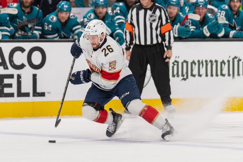 Nov 14, 2023; San Jose, California, USA; Florida Panthers defenseman Uvis Balinskis (26) controls the puck during the first period against the San Jose Sharks at SAP Center at San Jose. Mandatory Credit: Stan Szeto-USA TODAY Sports