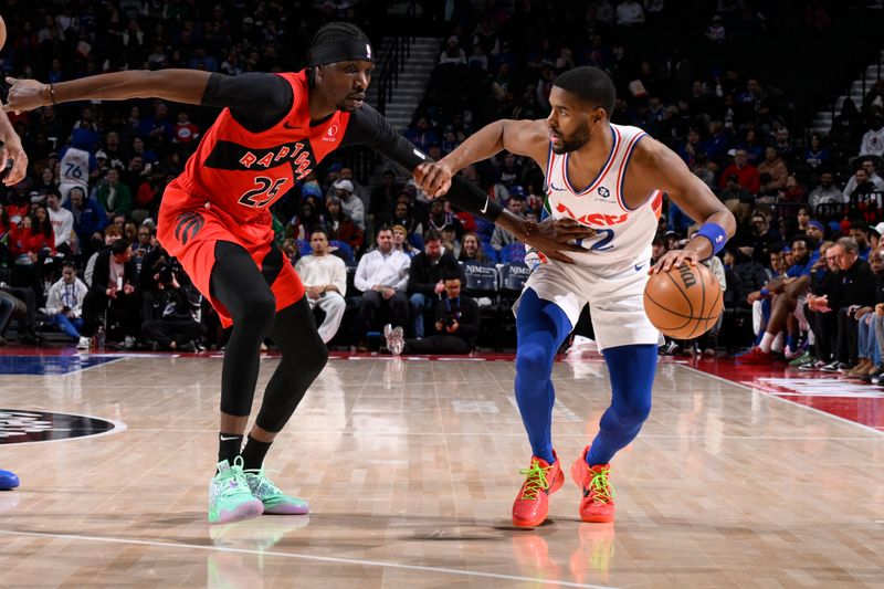 PHILADELPHIA, PA - FEBRUARY 11:  Jared Butler #12 of the Philadelphia 76ers dribbles the ball during the game against the Toronto Raptors on February 11, 2025 at the Wells Fargo Center in Philadelphia, Pennsylvania NOTE TO USER: User expressly acknowledges and agrees that, by downloading and/or using this Photograph, user is consenting to the terms and conditions of the Getty Images License Agreement. Mandatory Copyright Notice: Copyright 2025 NBAE (Photo by David Dow/NBAE via Getty Images)