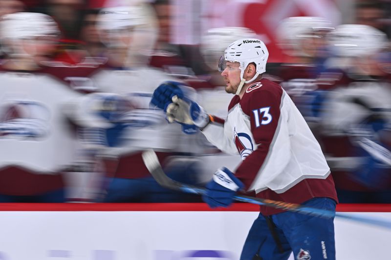 Dec 19, 2023; Chicago, Illinois, USA; Colorado Avalanche forward Valeri Nichushkin (13) celebrates with the bench after scoring a power play goal in the first period against the Chicago Blackhawks at United Center. Mandatory Credit: Jamie Sabau-USA TODAY Sports