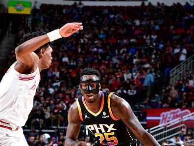 HOUSTON, TX - DECEMBER 27:   Nassir Little #25 of the Phoenix Suns handles the ball during the game against the Houston Rockets on December 27, 2023 at the Toyota Center in Houston, Texas. NOTE TO USER: User expressly acknowledges and agrees that, by downloading and or using this photograph, User is consenting to the terms and conditions of the Getty Images License Agreement. Mandatory Copyright Notice: Copyright 2023 NBAE (Photo by Logan Riely/NBAE via Getty Images)