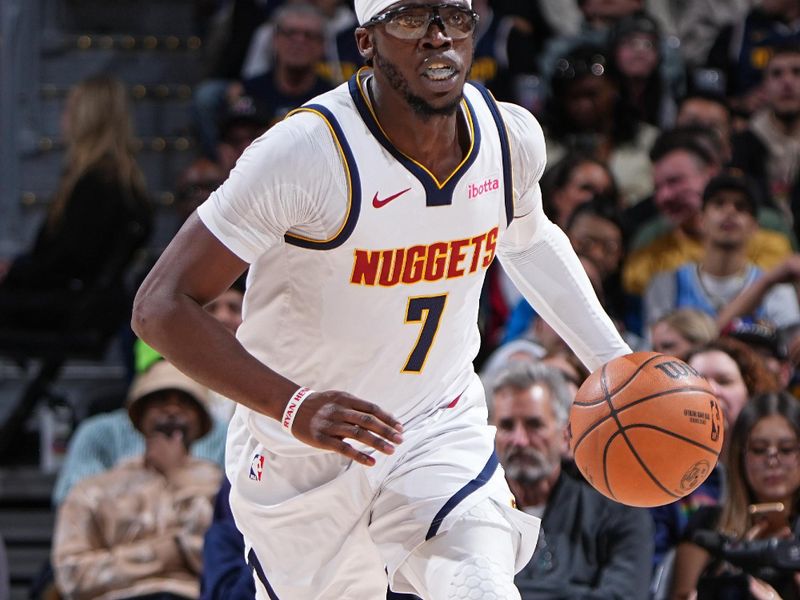 DENVER, CO - FEBRUARY 28: Reggie Jackson #7 of the Denver Nuggets brings the ball up court during the game against the Sacramento Kings on February 28, 2024 at the Ball Arena in Denver, Colorado. NOTE TO USER: User expressly acknowledges and agrees that, by downloading and/or using this Photograph, user is consenting to the terms and conditions of the Getty Images License Agreement. Mandatory Copyright Notice: Copyright 2024 NBAE (Photo by Garrett Ellwood/NBAE via Getty Images)