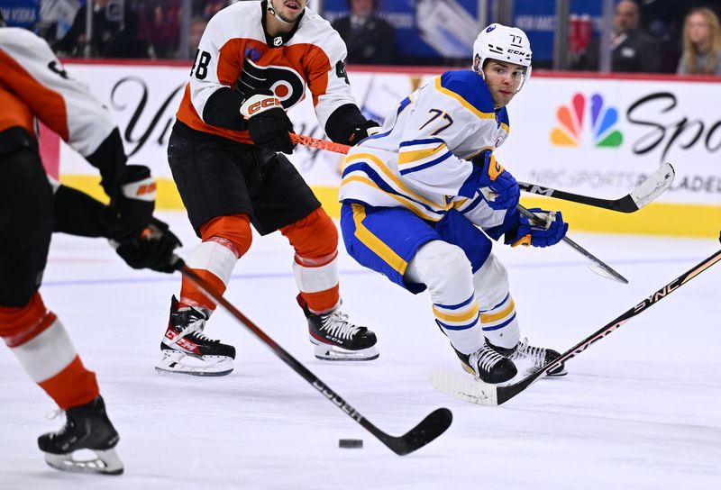 Nov 1, 2023; Philadelphia, Pennsylvania, USA; Buffalo Sabres right wing JJ Peterka (77) watches the puck against the Philadelphia Flyers in the second period at Wells Fargo Center. Mandatory Credit: Kyle Ross-USA TODAY Sports