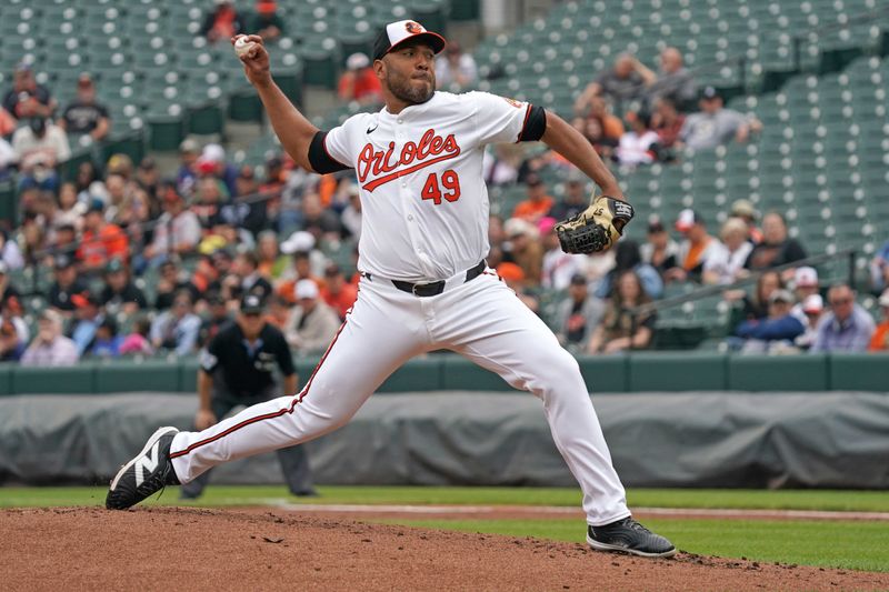 Apr 17, 2024; Baltimore, Maryland, USA; Baltimore Orioles pitcher Albert Suarez (4) delivers in the second inning against the Minnesota Twins at Oriole Park at Camden Yards. Mandatory Credit: Mitch Stringer-USA TODAY Sports