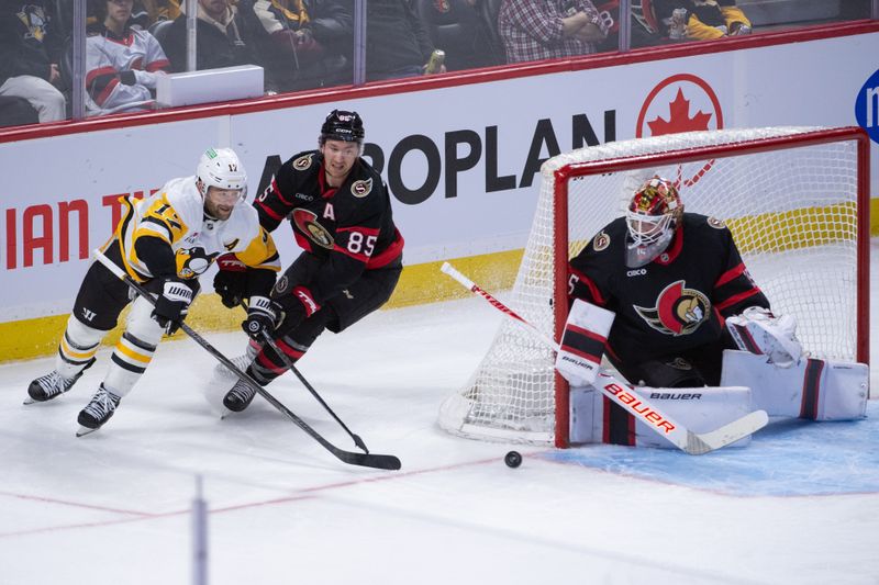 Dec 18, 2025; Ottawa, Ontario, CAN; Pittsburgh Penguins right wing Bryan Rust (17) tries a wrap-around on Ottawa Senators goalie Linus Ullmark (35) in the third period at the Canadian Tire Centre. Mandatory Credit: Marc DesRosiers-IMAGN Images