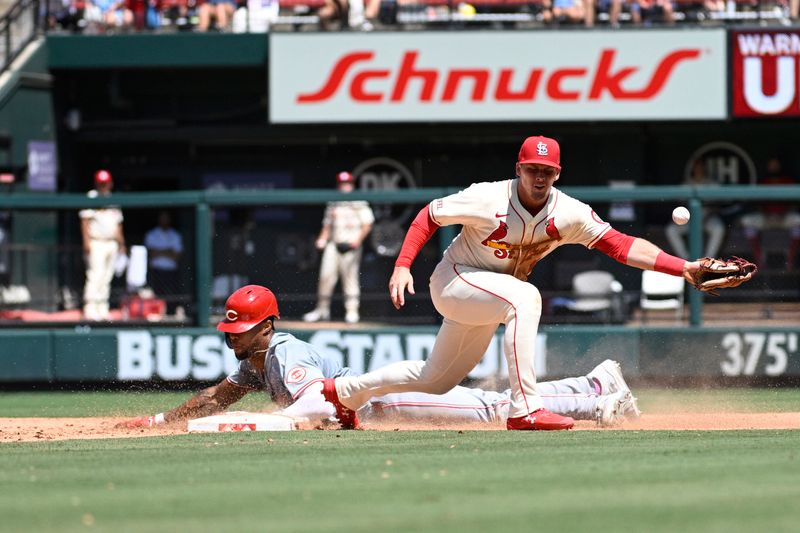 Jun 29, 2024; St. Louis, Missouri, USA; St. Louis Cardinals second baseman Nolan Gorman (16) misses the catch as Cincinnati Reds outfielder Will Benson (30) steals second base during the fifth inning  at Busch Stadium. Mandatory Credit: Jeff Le-USA TODAY Sports