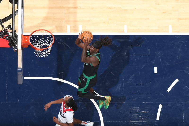 WASHINGTON, DC -? OCTOBER 24: Jrue Holiday #4 of the Boston Celtics drives to the basket during the game against the Washington Wizards on October 24, 2024 at Capital One Arena in Washington, DC. NOTE TO USER: User expressly acknowledges and agrees that, by downloading and or using this Photograph, user is consenting to the terms and conditions of the Getty Images License Agreement. Mandatory Copyright Notice: Copyright 2024 NBAE (Photo by Stephen Gosling/NBAE via Getty Images)