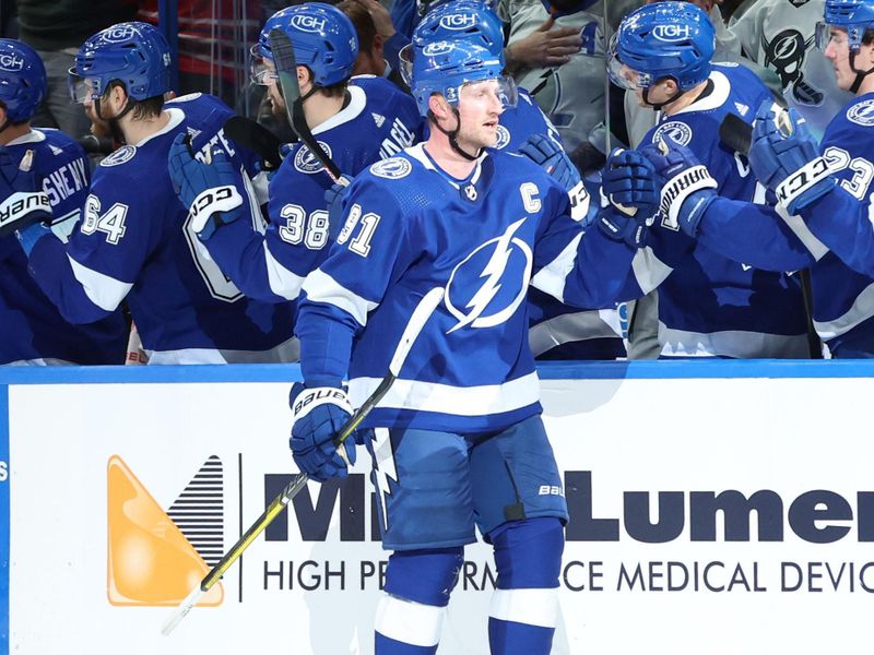 Jan 25, 2024; Tampa, Florida, USA; Tampa Bay Lightning center Steven Stamkos (91) celebrates after he scored a goal against the Arizona Coyotes during the second period at Amalie Arena. Mandatory Credit: Kim Klement Neitzel-USA TODAY Sports