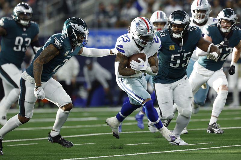 Dallas Cowboys running back Rico Dowdle (23) carries the ball during an NFL football game against the Philadelphia Eagles on Sunday, Nov. 10, 2024, in Arlington, Texas. (AP Photo/Matt Patterson)