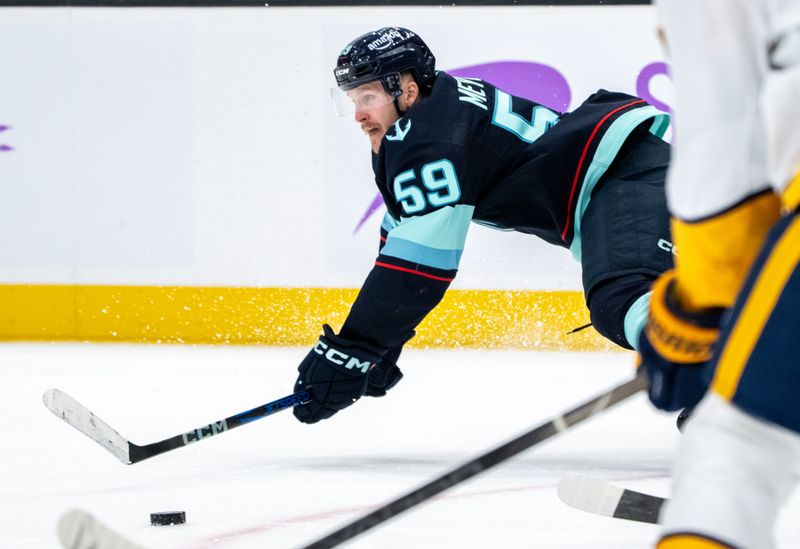 Nov 20, 2024; Seattle, Washington, USA;  Seattle Kraken forward Ben Meyers (59) dives for a puck during the second period against the Nashville Predators at Climate Pledge Arena. Mandatory Credit: Stephen Brashear-Imagn Images