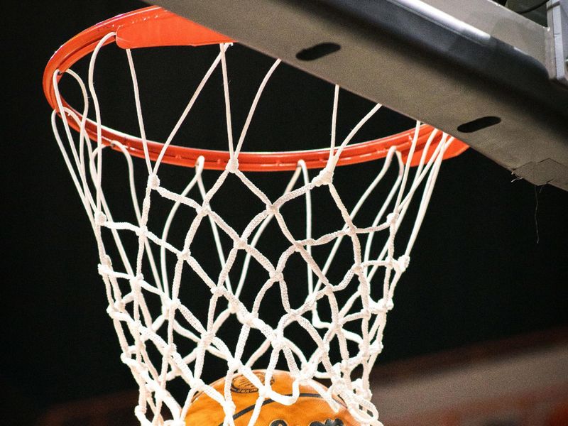 Dec 21, 2025; Stillwater, Oklahoma, USA; Practice ball in the net during warmups prior to the game between the Oklahoma State Cowboys and the Cal State Fullerton Titans at Gallagher-Iba Arena. Mandatory Credit: William Purnell-Imagn Images